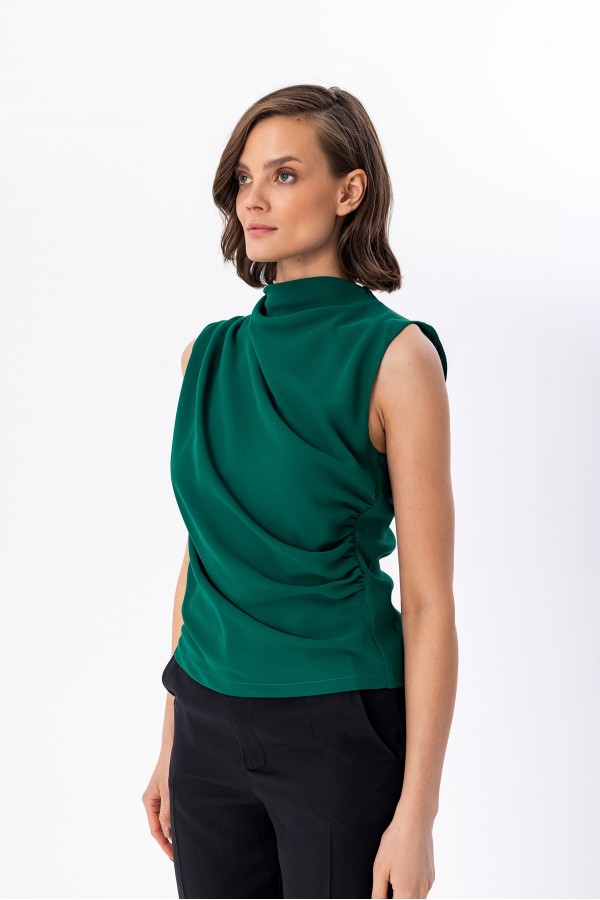 Yüksek Yaka Kolsuz Bluz Zumrut Yüksek Yaka Kolsuz Bluz Zumrut