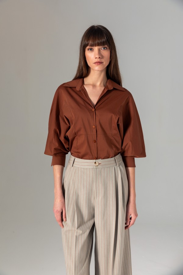 Bele Oturan Gömlek Ki̇remi̇t