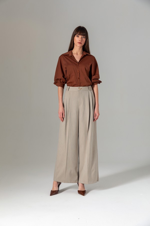 Bele Oturan Gömlek Ki̇remi̇t